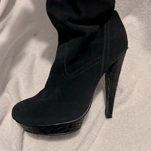 Black platform heeled boots, thigh high